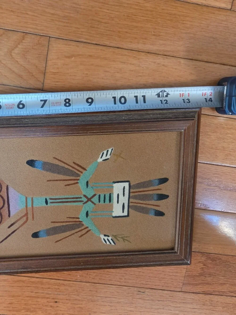 vintage Navajo sand art depicting Yei holy person figure framed